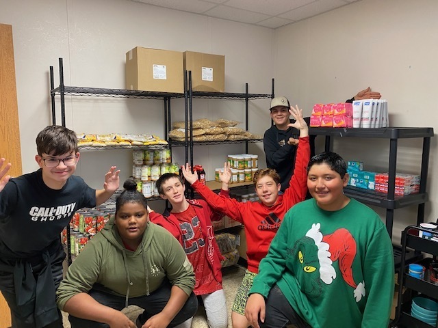 Students helped to unload food for Food Pantry